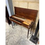 Morley (c1984) A clavichord in a mahogany case on turned reeded supports.