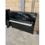 Yamaha (c1993) A Model P116 upright piano in a modern style bright ebonised case; together with a