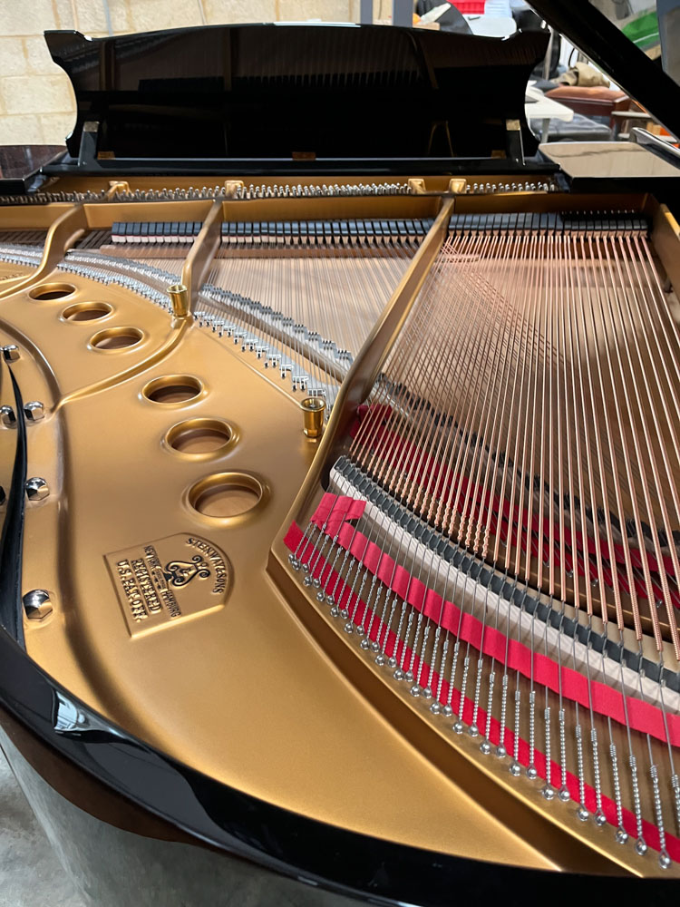 Steinway (c1958) A 5ft 7in Model M grand piano in a bright ebonised case on square tapered legs. - Image 9 of 9