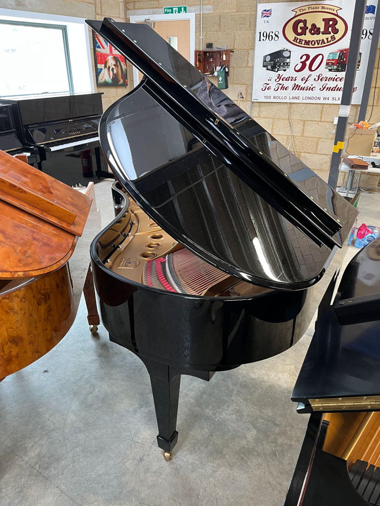 Steinway (c1958) A 5ft 7in Model M grand piano in a bright ebonised case on square tapered legs. - Image 8 of 9