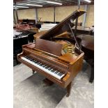 Bösendorfer (c1924) A 5ft 7in grand piano in a mahogany case on square tapered legs; together with a