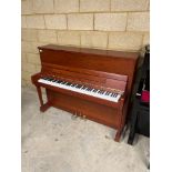 Bohemia (c2009) A Model 113 Menuet upright piano in a satin cherry wood case; together with a duet