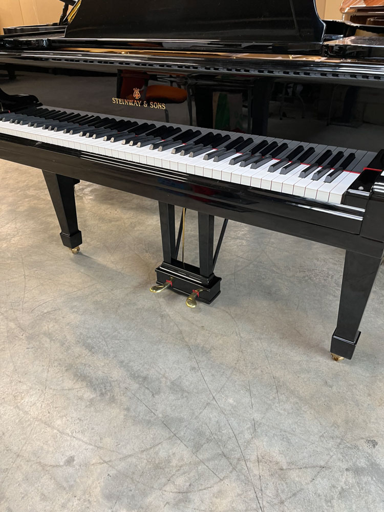 Steinway (c1958) A 5ft 7in Model M grand piano in a bright ebonised case on square tapered legs. - Image 3 of 9