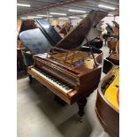 Blüthner (c1911) A 6ft 3in grand piano in a rosewood case on turned fluted tapered legs. This
