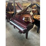 Yamaha (c2010) A 4ft 11in Model GB1 grand piano in a bright mahogany case on square tapered legs.