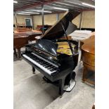Yamaha (c1974) A 6ft 1in Model C3 grand piano in an ebonised case on square tapered legs.