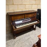Steinway (c1900) A Model EE upright piano in a traditional rosewood case; together with a stool.