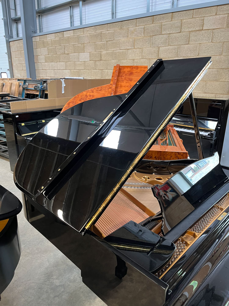 Steinway (c1958) A 5ft 7in Model M grand piano in a bright ebonised case on square tapered legs. - Image 7 of 9