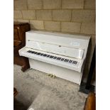 Kawai (c2013) A Model K15-E upright piano in a bright white case; together with a matching stool.