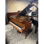 Blüthner (c1922) A 6ft 3in Model 7 grand piano in a rosewood case on square tapered legs; together