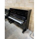 Yamaha (c1976) A 130cm Model U3 upright piano in a traditional bright ebonised case; together with a