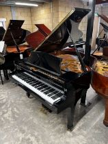 Kawai (c1984) A 5ft 8in Model KG-2D grand piano in a bright ebonised case on square tapered legs.