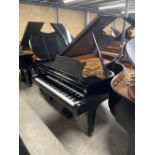 Steinway (c1976) A 6ft 11in Model B grand piano in a satin ebonised case on square tapered legs.