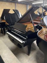 Steinway (c1976) A 6ft 11in Model B grand piano in a satin ebonised case on square tapered legs.