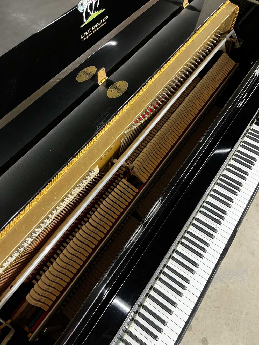 Knight (c1996) A Model 120 upright piano in a bright ebonised case; together with a matching stool. - Image 4 of 5