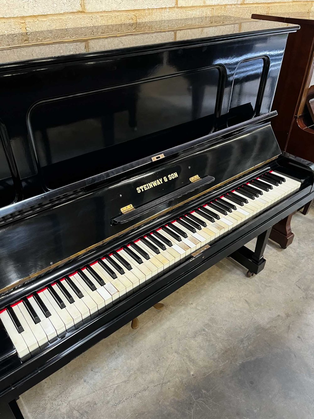 Steinway (c1923) A Model K upright piano in an ebonised case; together with a stool. IRN: V181G9S3 - Image 2 of 6