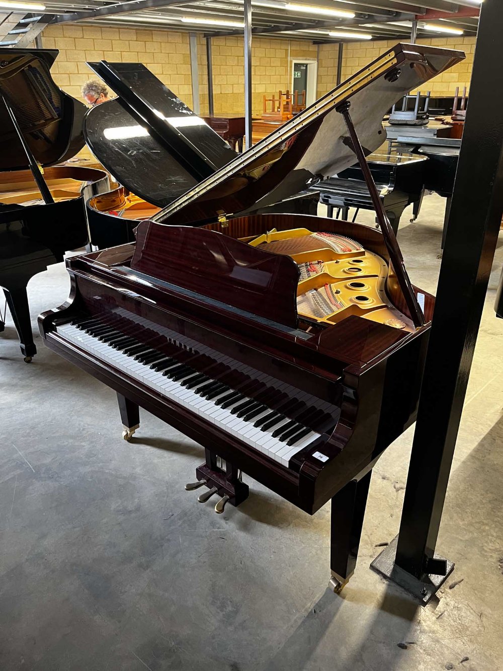 Yamaha (c2006) A 5ft Model GB1 grand piano in a bright mahogany case on square tapered legs.