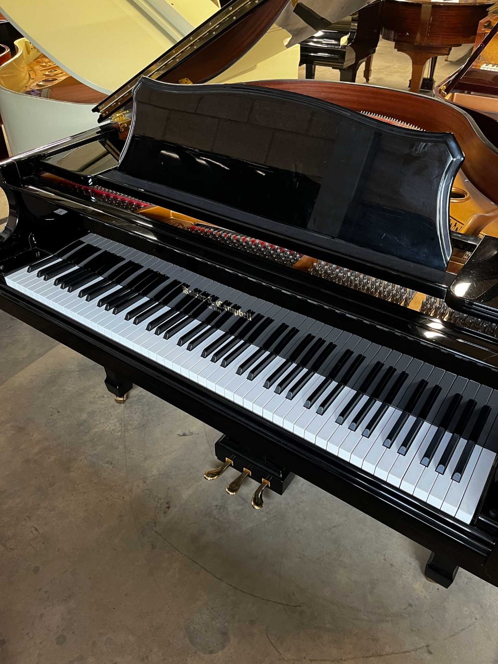 Kholer and Cambell (c2010) A 4ft 9in Model KIG 48 grand piano in a bright ebonised case on square - Image 2 of 9