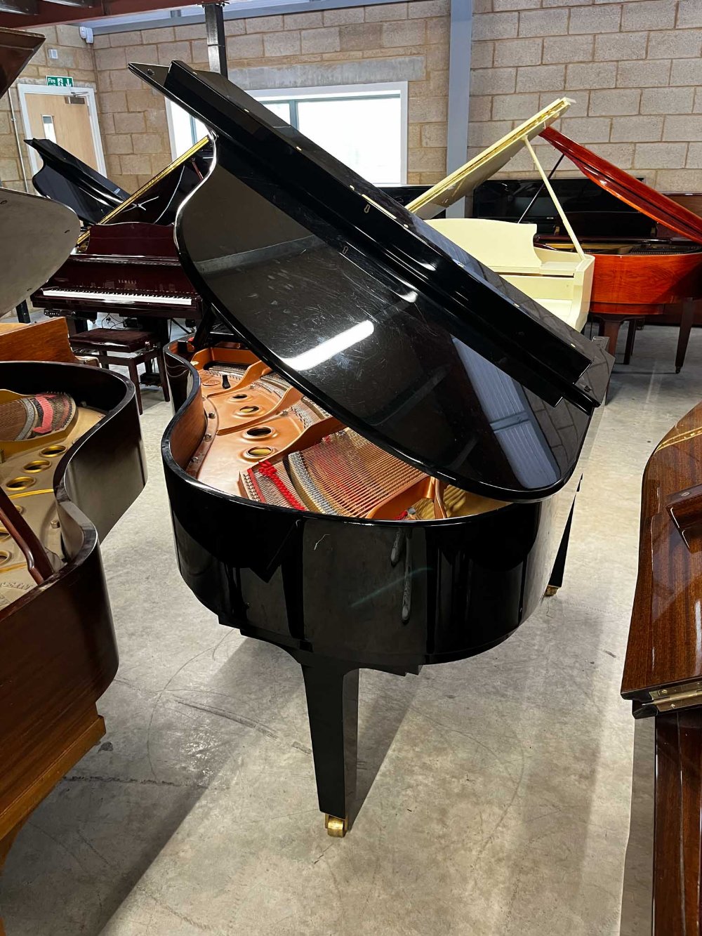 Yamaha (c2012) A 5ft 8in Model C2X grand piano in a bright ebonised case on square tapered legs; - Image 7 of 9