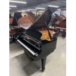 Yamaha (c2003) A 6ft 3in Model S4 grand piano in a bright ebonised case on square tapered legs.