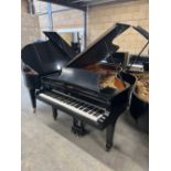 Steinway (c1973) A 6ft 11in Model B grand piano in a satin ebonised case on square tapered legs.
