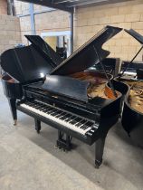 Steinway (c1973) A 6ft 11in Model B grand piano in a satin ebonised case on square tapered legs.