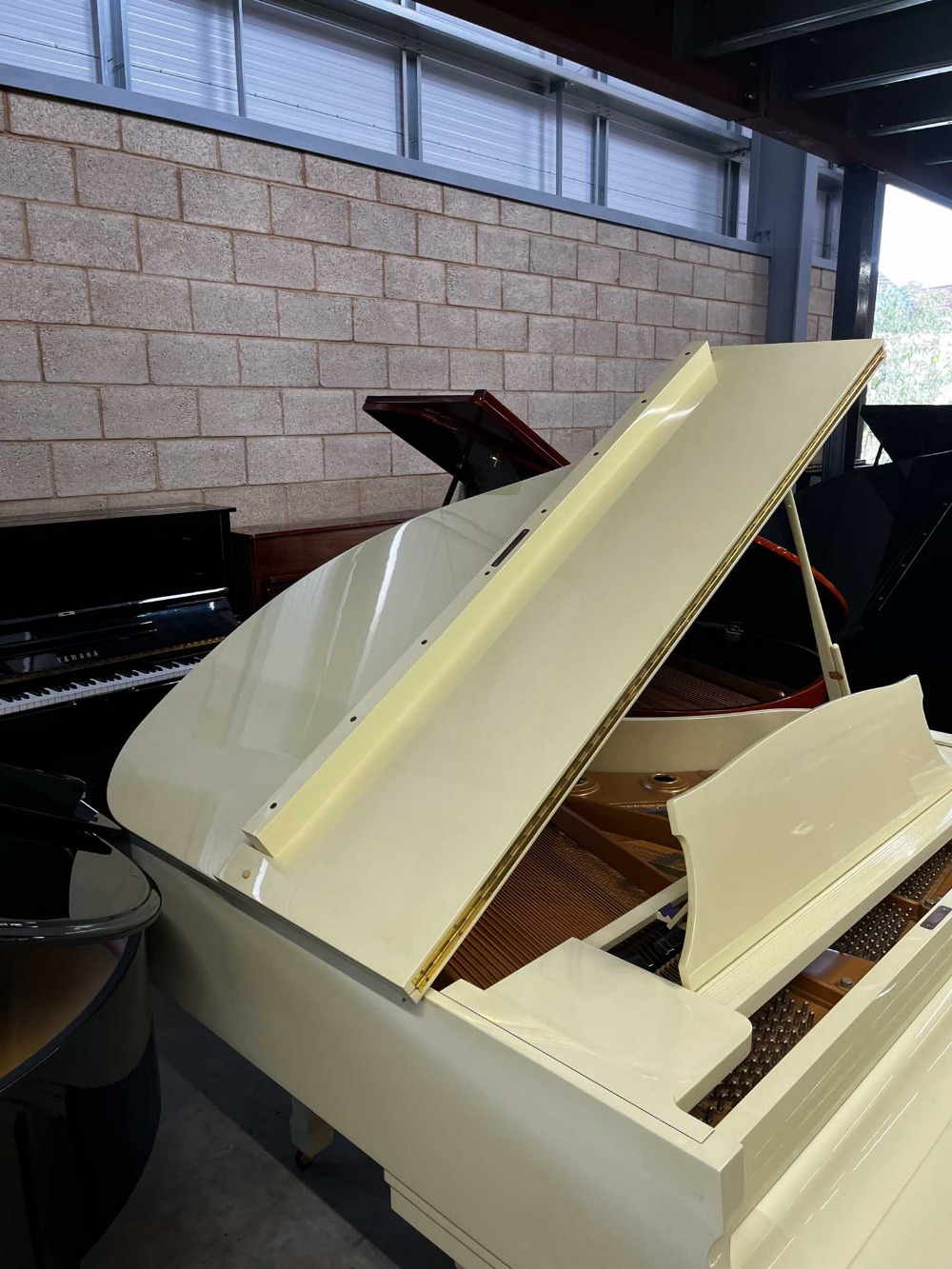 Kawai (c1984) A 5ft 1in Model KG-1D grand piano in a cream case on square tapered legs; together - Image 6 of 8