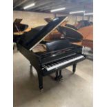 Yamaha (c1980) A 6ft 7in Model G5 grand piano in a bright ebonised case on square tapered legs.