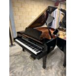 Yamaha (c2010) A 6ft 1in Model C3 grand piano in a bright ebonised case on square tapered legs;