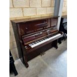 Kawai (c1976) A 132cm Model BL-61 upright piano in a traditional bright mahogany case; together with