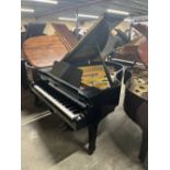 Yamaha (c1974) A 6ft 1in Model C3 grand piano in a bright ebonised case on square tapered legs.