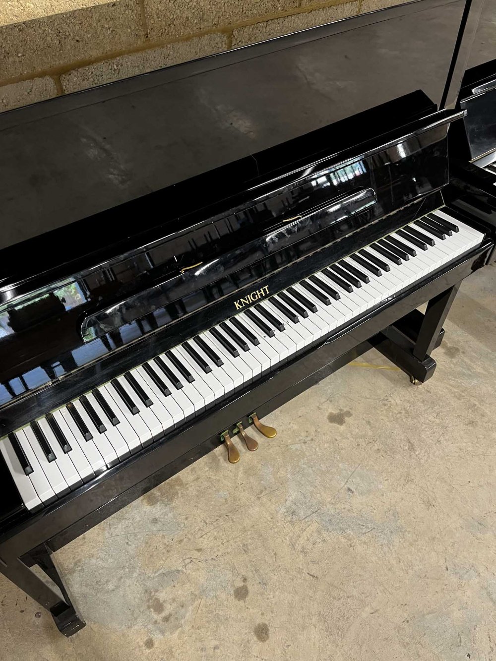 Knight (c1996) A Model 120 upright piano in a bright ebonised case; together with a matching stool. - Image 2 of 5