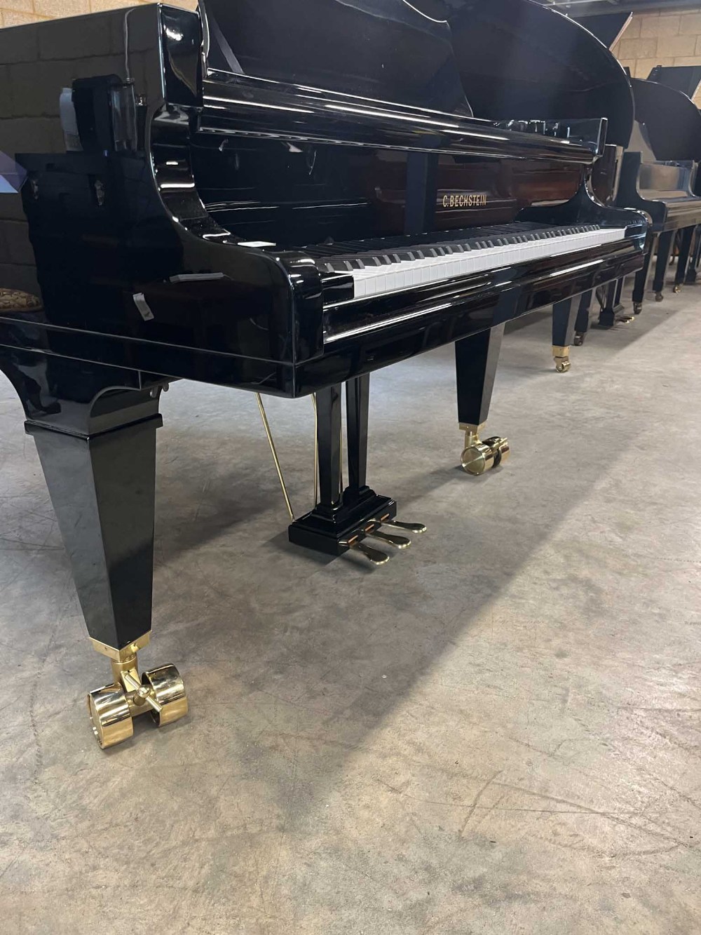 Bechstein (c1985) A 9ft 2in concert grand piano in a bright ebonised case on square tapered legs. - Image 3 of 10