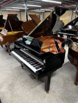 Yamaha (c2012) A 5ft 8in Model C2X grand piano in a bright ebonised case on square tapered legs;