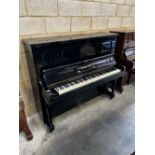 Steinway (c1923) A Model K upright piano in an ebonised case; together with a stool. IRN: V181G9S3