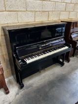 Steinway (c1923) A Model K upright piano in an ebonised case; together with a stool. IRN: V181G9S3