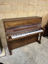 Rogers (c1996) An upright piano in a traditional case in contrasting mahogany veneers; together with