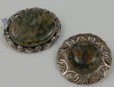 A selection of moss agate jewellery comprised of two brooches, a pair of cuff-links, four rings
