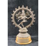 An Indian bronze figure of the Hindu god Shiva, raised on oval wooden plinth CONDITION REPORTS &