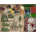 Two Britains die cast trees, hedgerow sections, fences and hurdles, (16 pieces) and a large