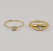 A yellow metal diamond single stone ring, the round brilliant cut stone approximately  0.25