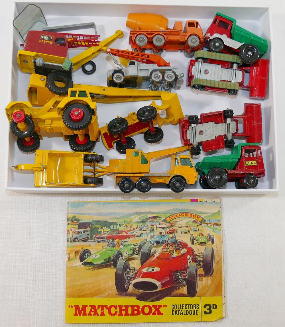 A collection of 120+ assorted mainly Matchbox vehicles, including Esso fuel pumps, a garage and