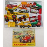 A collection of 120+ assorted mainly Matchbox vehicles, including Esso fuel pumps, a garage and