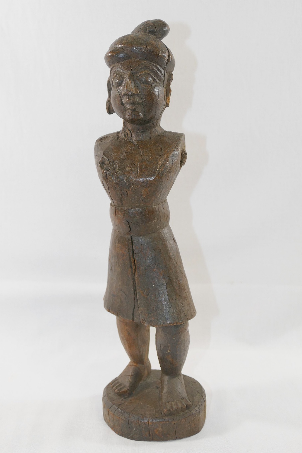 An Indian carved wooden figure, moving arms lacking, 35cm highCONDITION REPORTS & PAYMENT