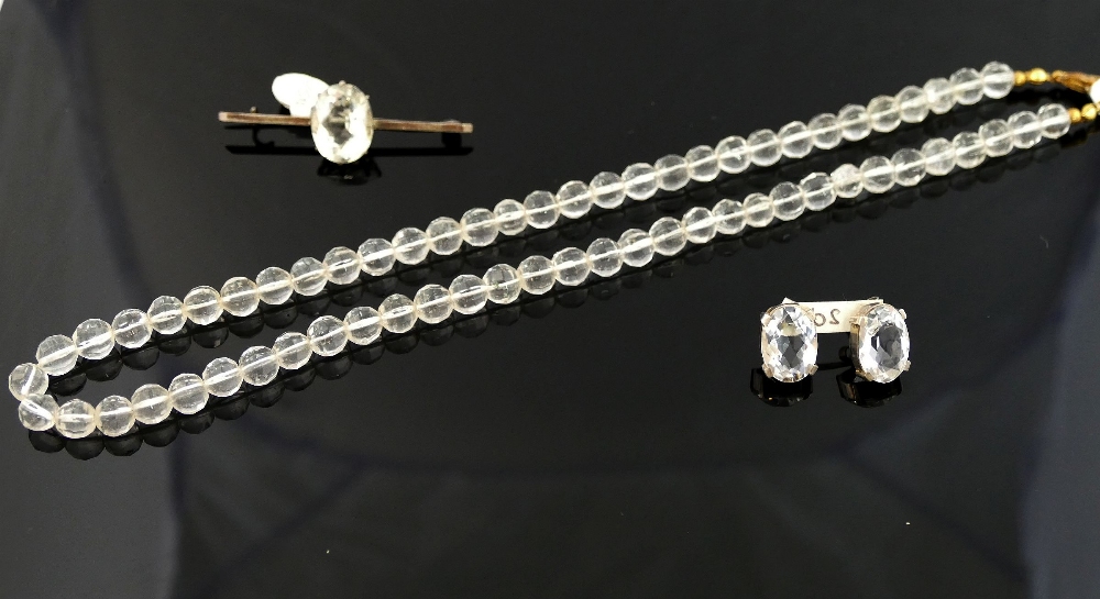 A selection of rock crystal and smokey quartz jewellery comprised of a 'Miracle' silver rock crystal - Image 3 of 6
