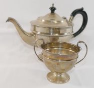 A silver teapot with ebonised handle and knop, and matching sugar bowl, Birmingham 1856, combined