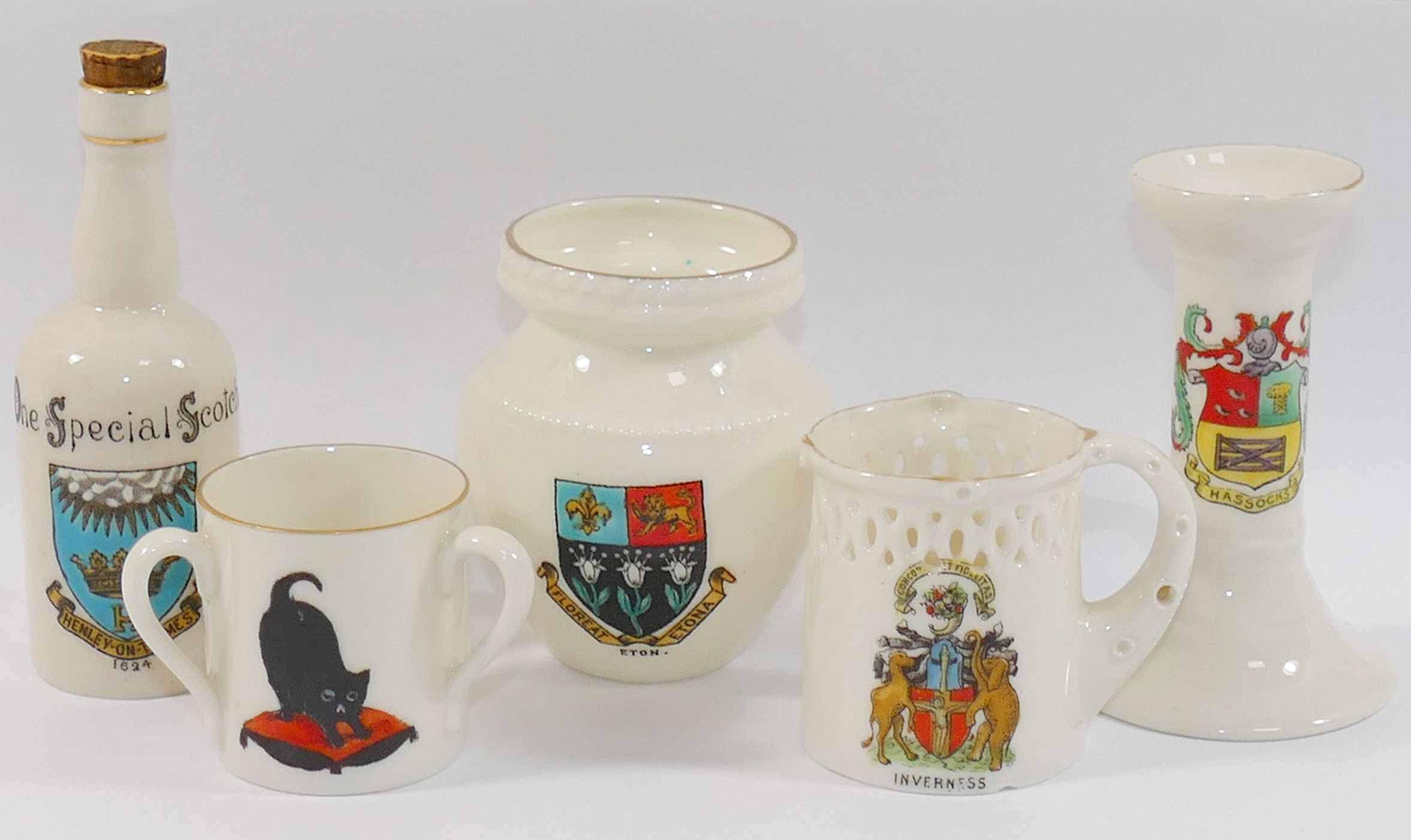 A collection of crested china, including a Vienna City of London teaset, a Willow Art Eton vase, a