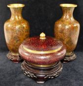 A pair of 20th century People's Republic of China cloisonné vases, and a similar lidded bowl, each