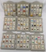 192 pairs of paste, bead and other mainly drop earrings housed in presentation display stands We are