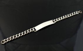 A silver curb link identity bracelet the rectangular panel 11mm wide We are pleased to be offering